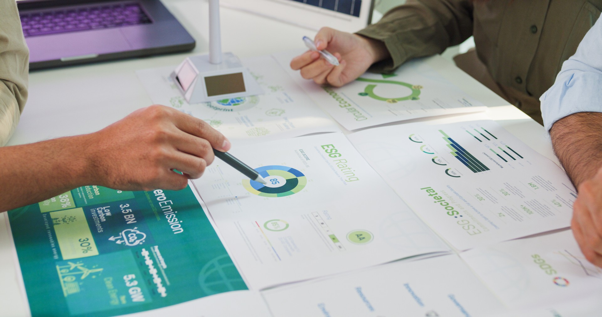 Closeup group businesspeople talk ESG strategies risk management workshop, SDGs report, global warming, green finance investment eco friendly and net zero waste in boardroom training building.